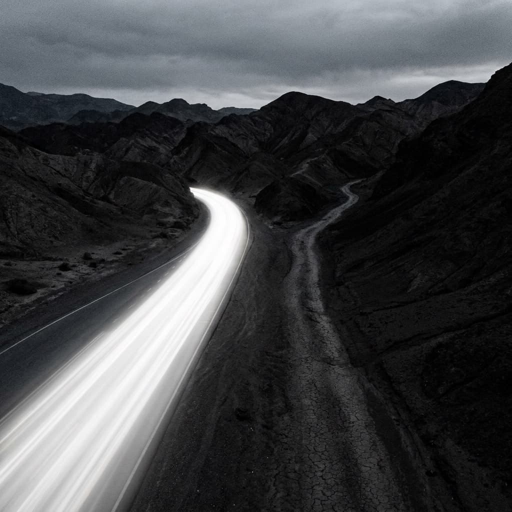 Abstract illustration of two diverging paths, one luminous and fast-moving, one lagging behind, representing the gap between AI deployment and governance readiness