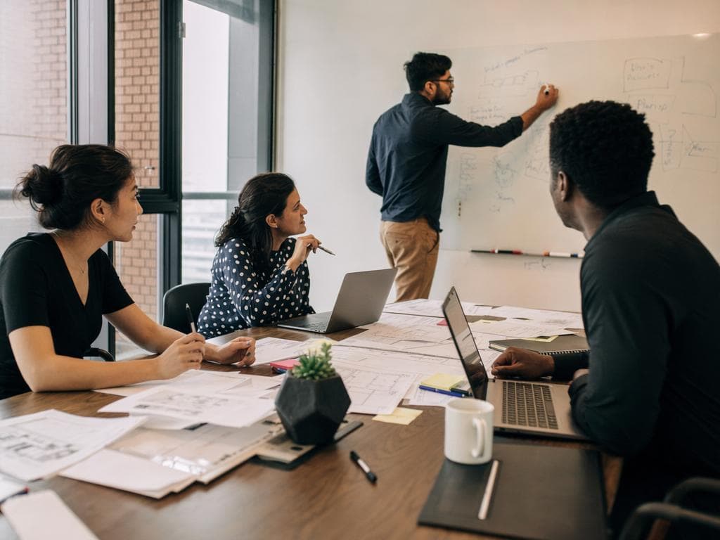 Strategy session scoping an AI engagement